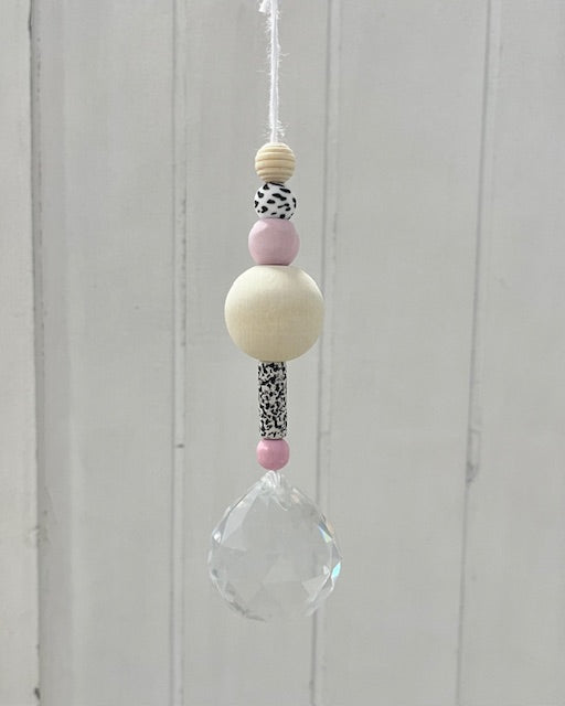 Suncatcher rosa/gesprenkelt schwarz