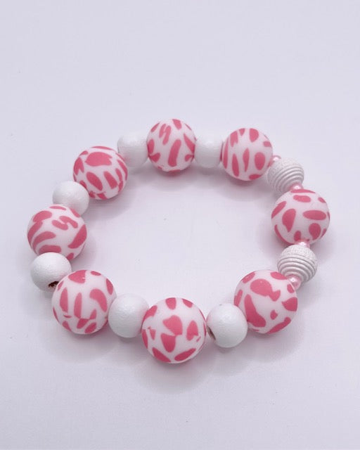 Armband weiß mit pinken Leoperlen